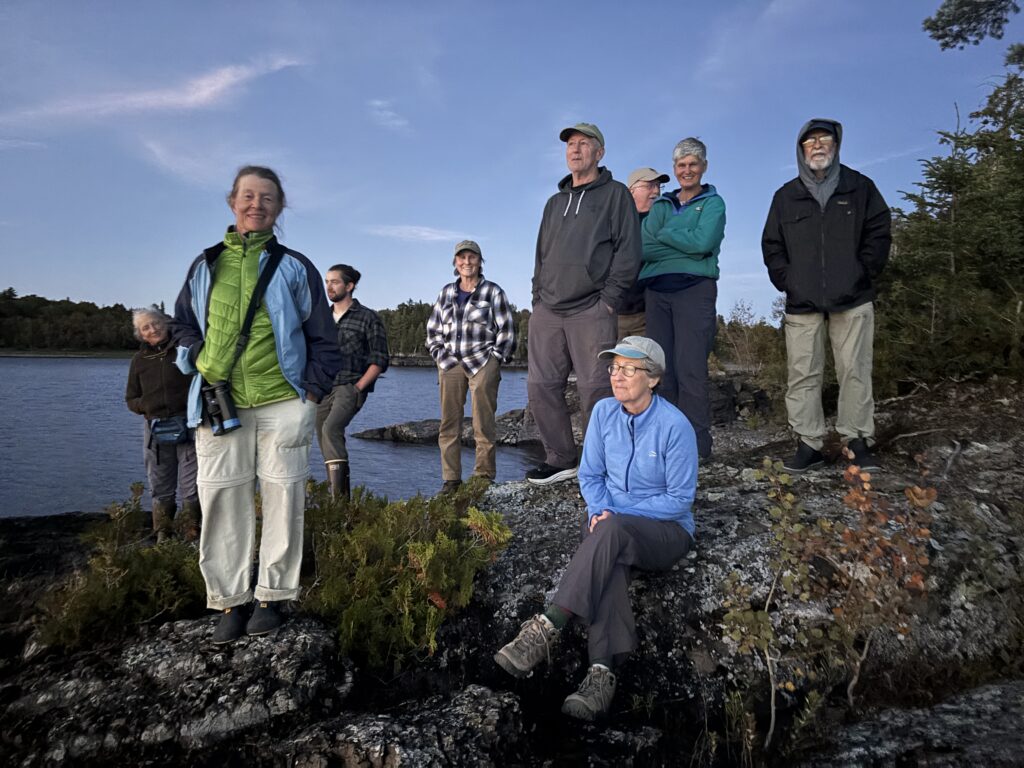 nbnc travelers on a rock beside the west branch of the penobscot